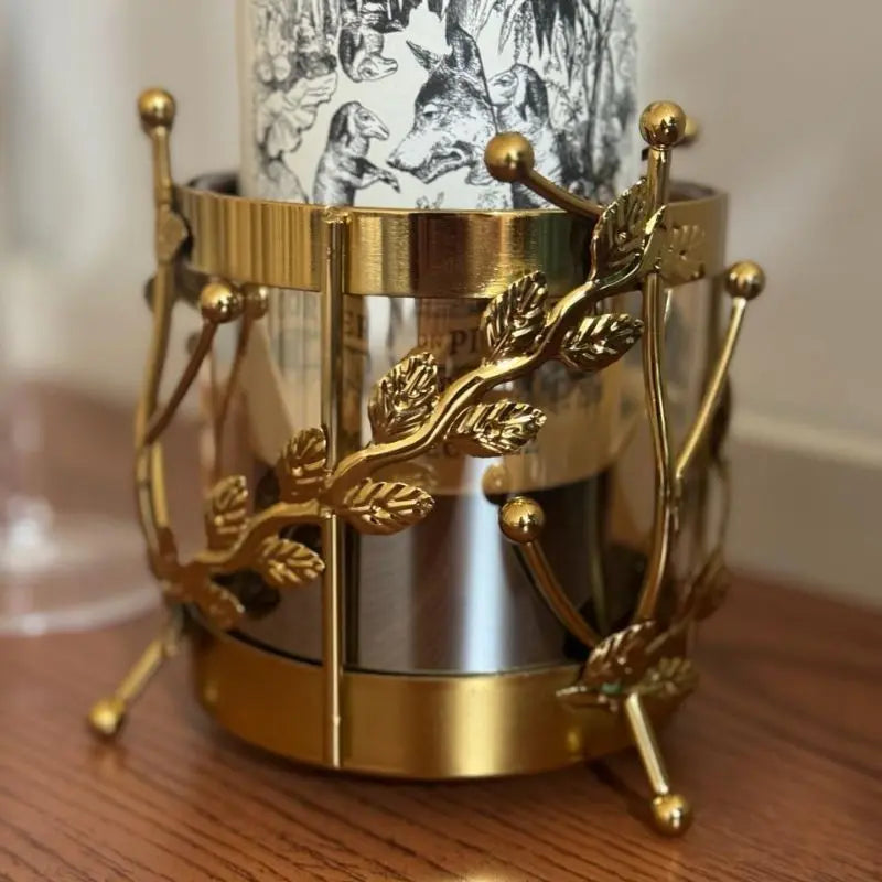 Majestic Wine Bottle Holder — elegant metal and glass design for wine bottles and table décor. Modern accessory by Trustique.