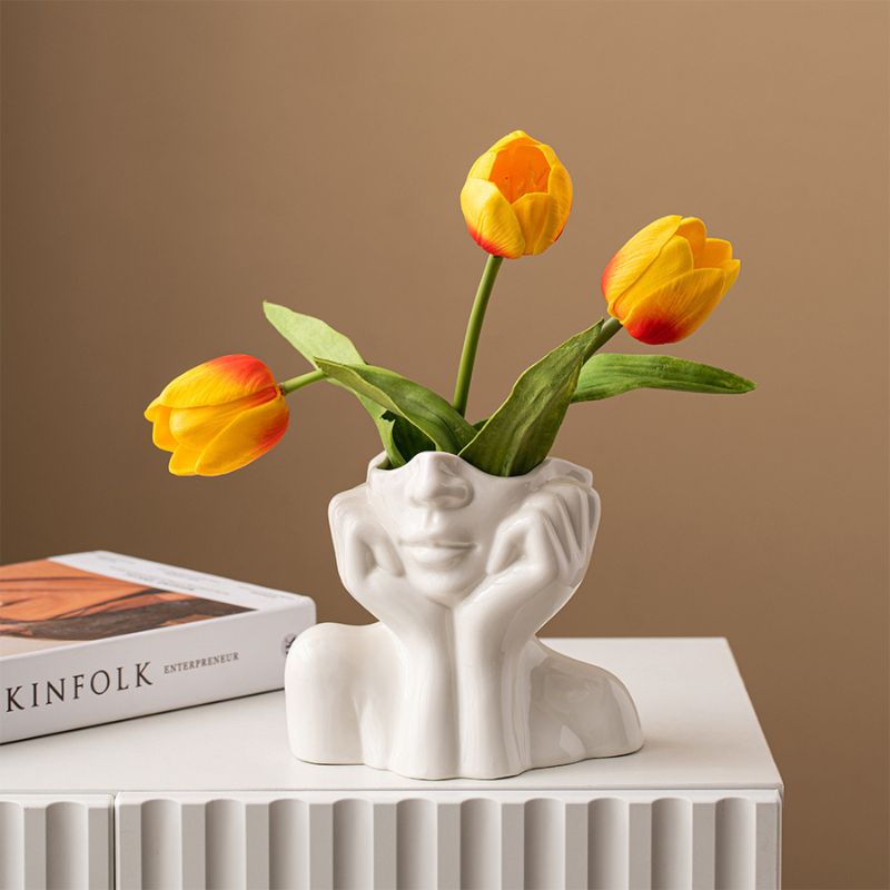 Faces Statue Vase