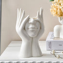 Faces Statue Vase